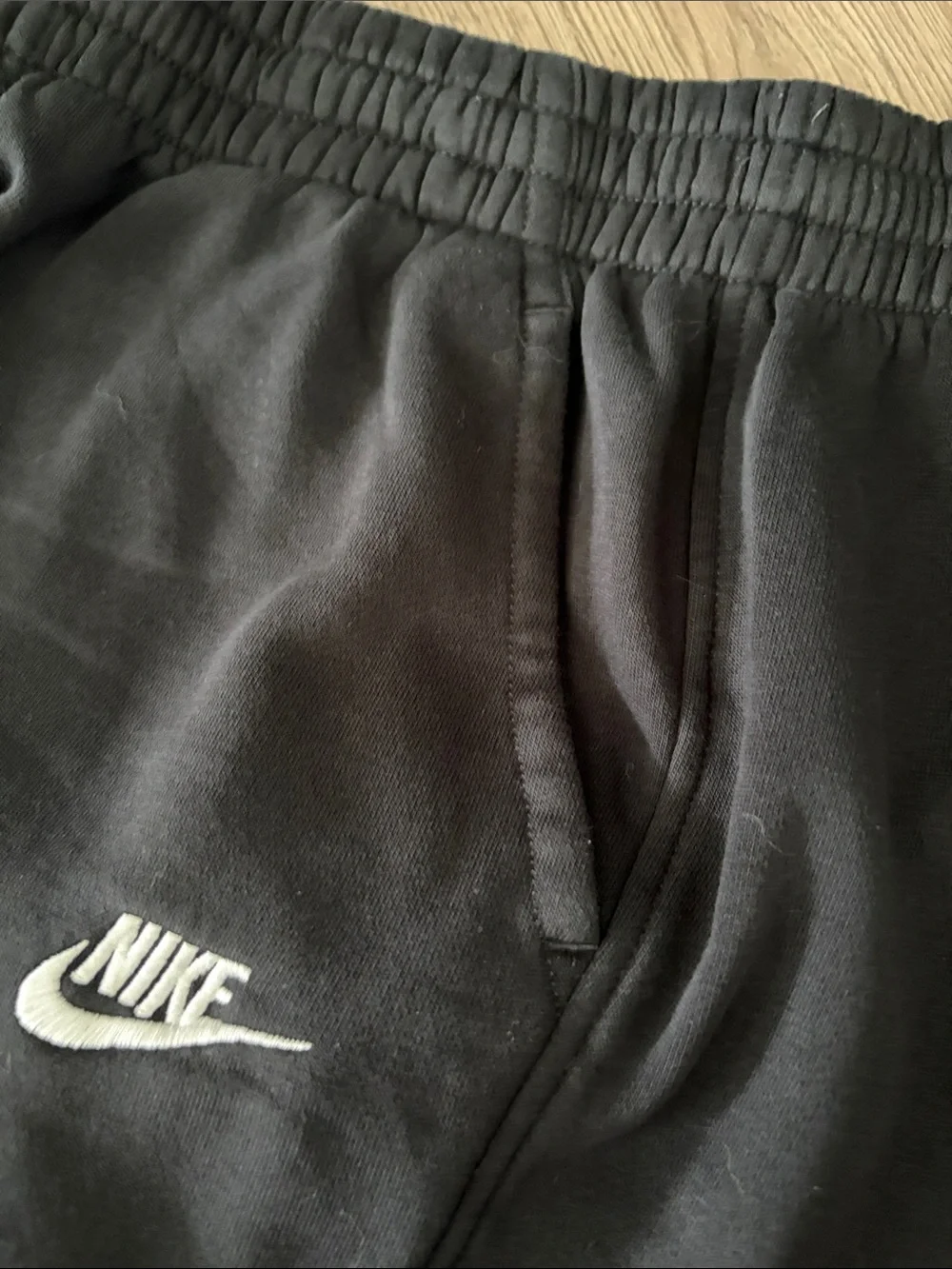 Nike Black Kids Jogger Sweatpants with White Swoosh. Boys size large.